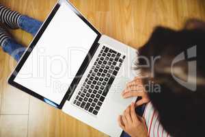 High angle view of woman using laptop