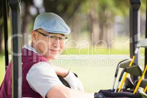 Golfer smiling and posing