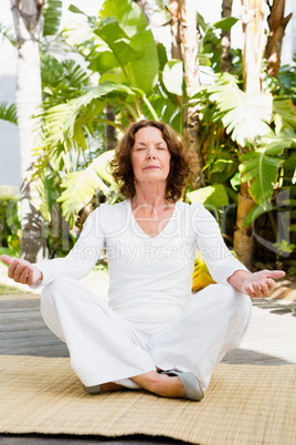 Mature woman doing yoga