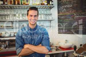 Portrait of handsome cafe owner