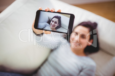 High angle view of woman taking selfie