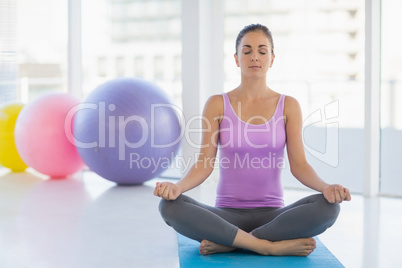 Full length of woman doing yoga