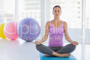 Full length of woman doing yoga