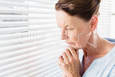 Close-up of thoughtful mature woman