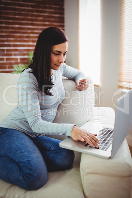 Young woman doing online shopping