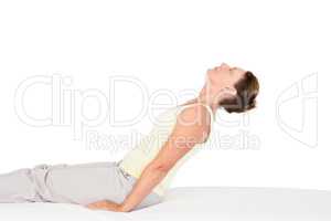 Calm woman exercising on bed