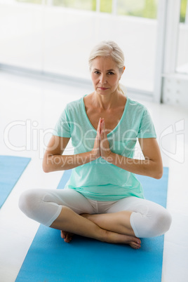 Portrait of senior woman doing yoga