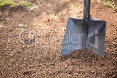 High angle view of shovel on dirt