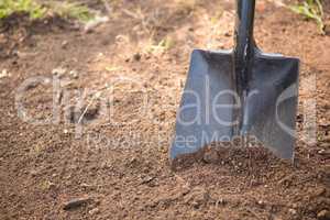High angle view of shovel on dirt