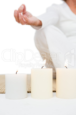 Cropped image of mature woman meditating