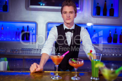 Portrait of confident bartender standing