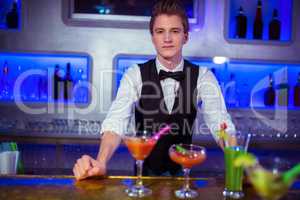 Portrait of confident bartender standing