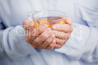 Woman holding herbal tea