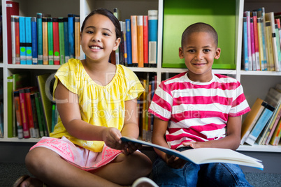 Porrait of elementary students at library in school