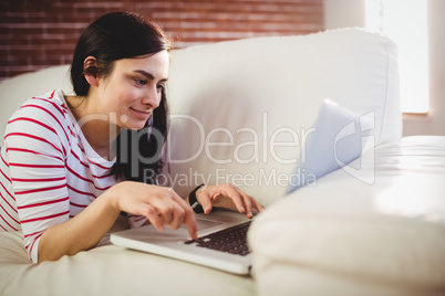 Young woman using laptop