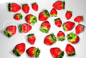 Strawberries with leaves. Isolated on a white background.