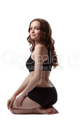 Image of smiling teenage girl in sports underwear