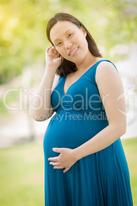 Young Pregnant Chinese Woman Portrait in Park