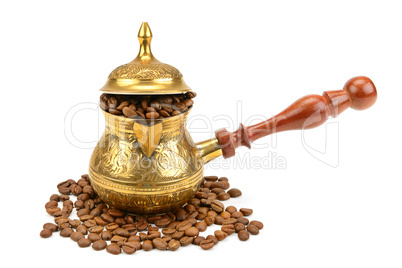 coffeepot and coffee beans isolated on white background