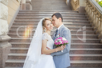 The bride and groom for a walk