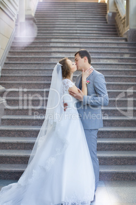 The bride and groom for a walk