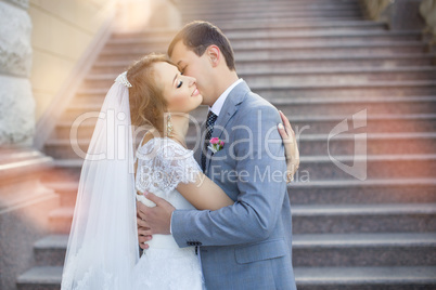 The bride and groom for a walk