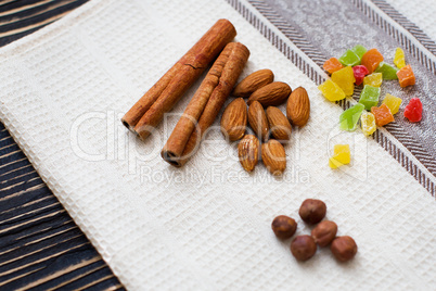 Nuts and candied fruits on the board texture