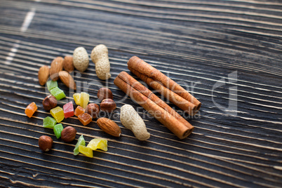 Nuts and candied fruits on the board texture