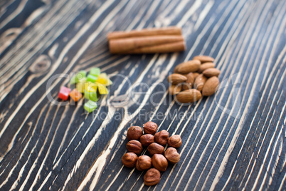 Nuts and candied fruits on the board texture