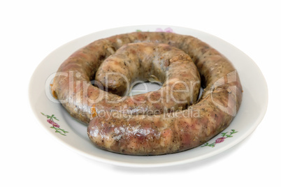 Fried pork sausage are homemade on a white background.