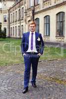 The groom in a lilac suit