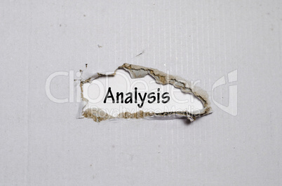 The word analysis appearing behind torn paper