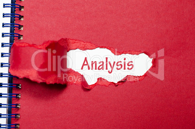 The word analysis appearing behind torn paper