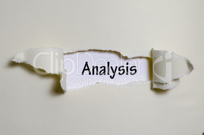 The word analysis appearing behind torn paper