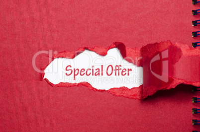 The word special offer appearing behind torn paper