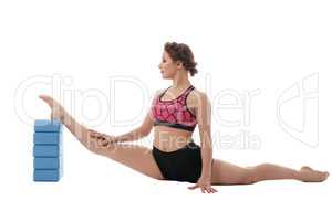 Woman exercising with bricks for stretching