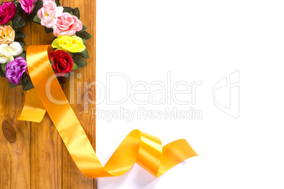 Traditional wreath with flowers and satin ribbon