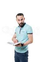 Man makes funny facial expression while reading
