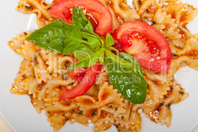 Italian pasta farfalle butterfly bow-tie and tomato sauce