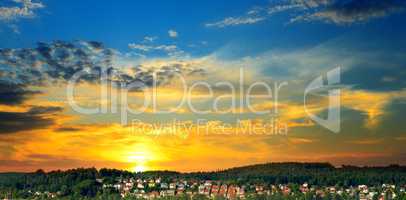 panorama of city against the background of sunset