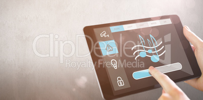 Composite image of man using tablet pc