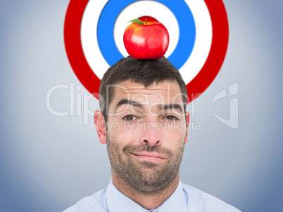 Composite image of businessman looking at the camera