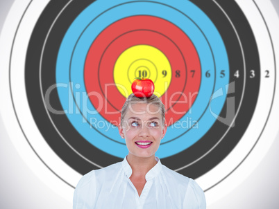 Composite image of smiling businesswoman looking up