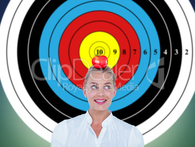 Composite image of smiling businesswoman looking up