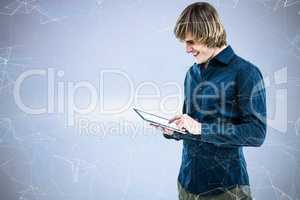 Composite image of hipster businessman using tablet