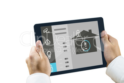 Composite image of man using tablet pc