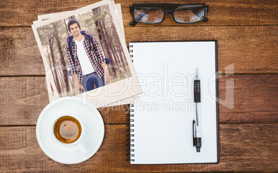 Composite image of portrait of happy man standing