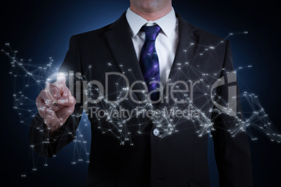 Composite image of businessman standing and pointing