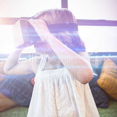 Young girl using a virtual reality device