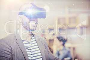 Male graphic designer wearing virtual glasses